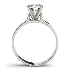 a diamond engagement ring on a white background