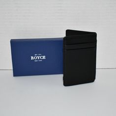 Royce New York Black Magic Leather Wallet Nib Details: Leather Lined Four Interior Card Slots Elastic Webbing Dimensions: 4"L X 3.25"H X 0.25"W Spot Clean New In Box Classic Black Wallet For Everyday Use, Classic Black Wallets For Everyday, Black Rectangular Wallet With Coin Pocket, Black Everyday Trifold Wallet, Classic Black Bifold Card Holder, Everyday Black Rectangular Trifold Wallet, Everyday Black Trifold Wallet, Black Rectangular Wallet With Rfid Blocking, Classic Black Wallets With Card Slots