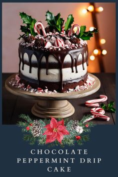 chocolate peppermint drip cake with candy canes and holly