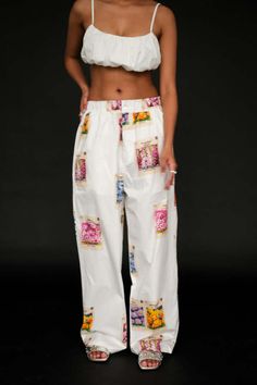 Tyler mcgillivary white cotton pant with seed packet print. pair with the matching blouse for a full set!    pipe and row Tyler Mcgillivary, Denim Jacket With Dress, Seed Packets, Knit Pants, Cotton Pants, Socks And Hosiery, Designer Outfits Woman, Full Set, Trousers Women