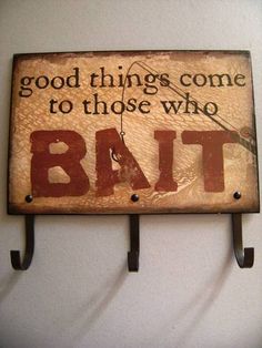 a wooden sign that says, good things come to those who bat on the wall