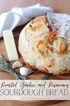 an image of bread and cheese on a cutting board with rosemary sprig next to it