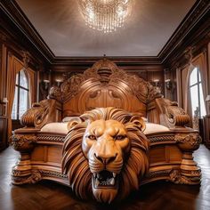 a large wooden bed with a lion head on it