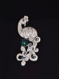 "ESTATE 18K SOLID GOLD 7.26CTS DIAMOND, EMERALD, SAPPHIRE AND BLACK OPAL PEACOCK BROOCH PENDANT F-G COLOR AND VS CLARITY UNTREATED NATURAL DIAMONDS AND 100% NATURAL UNTREATED GEMS. EXTREMELY HIGH END - TOP QUALITY PENDANT / BROOCH CHAIN IS NOT INCLUDED. ITS FOR DISPLAY ONLY. DESCRIPTION: THIS IS A TOP QUALITY PENDANT / BROOCH LOADED WITH STUNNING NATURAL BLUE SAPPHIRES, EMERALD, BLACK OPAL AND DIAMONDS IN A GORGEOUS PEACOCK DESIGN. THIS IS AN EXTREMELY FINE PENDANT WITH ATTENTION TO DETAILS THRO Luxury Formal Necklace With Brooch, Luxury Multi-stone Brooches For Anniversary, Fine Jewelry Diamond Multi-stone Brooch, Fine Jewelry Diamond Multi-stone Brooches, Multi-stone Diamond Brooches, Diamond Multi-stone Brooches In Fine Jewelry Style, Luxury Diamond Pendant Brooches, Luxury Diamond Brooches, Formal Multi-stone Brooch In Fine Jewelry Style