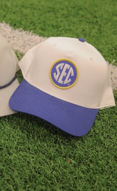 Rep the Southeastern Conference in this trendy trucker hat in the SEC colors. The two toned style is bold and blue and will be the perfect gameday (and every other day) accessory. ALL HATS ARE FINAL SALE! Please note that cotton trucker hats may be prone to fade over time due to sunlight or bleed due to moisture. Halloween Usa, Southeastern Conference, Platform Heels Boots, Sandal Platform, Gold And Blue, Blue And White Dress, Platform Sandals Heels, White Hat, Clothing Co