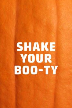 an orange pumpkin with the words shake your boo - ty printed on it's side