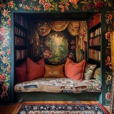 a room with bookshelves and floral wallpaper