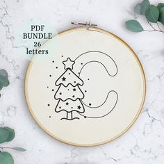 a cross stitch pattern with a christmas tree on it