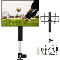 a soccer ball is in the air above a television screen and some cords are plugged into it