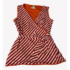 This Versatile Wrap Top From Serra Is Reversible, Offering Two Stylish Looks In One. Size Is Medium 8-10 Ideal For Casual Outings Or A Chic Office Look. Great For Spring, Summer Or Wear With A Cardigan For Fall! Condition Is New With Tags And Package, But Has Been Opened (As Shown In Photos) Sleeveless Design Reversible: Solid Orange Or Red & White Stripes Wrap Style With Belt Soft And Breathable Fabric Machine Washable Features: Casual Machine Wash, Tumble Dry Size: Womens Medium Condition Is N Spring Sleeveless Lined Top, Stretch Sleeveless Lined Tops, Red White Stripes, Solid Orange, Office Look, Chic Office, Red And White Stripes, Wrap Top, Orange Red