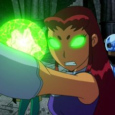 an animated character with green eyes holding a glowing object