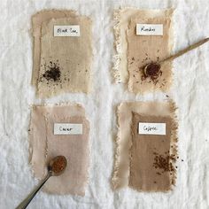 four pieces of cloth that have been torn off and are sitting on a table with a spoon in it