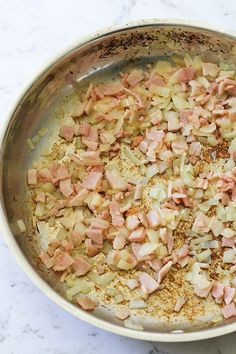 the food is prepared and ready to be cooked in the pan on the counter top