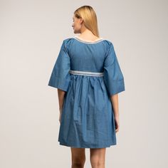 Boho-chic style with a modern accent. This denim mini dress features a spectacular embroidery detail in the chest, as well as romantic oversize french sleeves  and tassels to add more charm to this beautiful dress. Got any cowboy boots? It will be the perfect match! 100% Cotton. Wash Machine  30º ,  Press Medium  Temperature, Do  not  use spin-dry, Do not Bleach Cotton Mini Dress With Embroidered Hem, Chic Embroidered Cotton Mini Dress, Chic Cotton Mini Dress With Floral Embroidery, Chic Floral Embroidery Cotton Mini Dress, Floral Embroidered Cotton Mini Dress For Brunch, Spring Cotton Embroidered Mini Dress, Cotton Mini Dress With Floral Embroidery For Brunch, Embroidered Mini Dress For Daywear, Cotton Dresses With Embroidered Hem