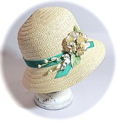 "A big girls cream colored cloche style hat with a lush bouquet of vintage flowers in cream and pale pink with sea foam green velvet. The bouquet rests on the side of the hat and measures 21\". To view my entire collection of Girl's Hats click on this Section.... https://www.etsy.com/your/shops/Marcellefinery/sections/16935555 Previous patrons of my shop have honored me with their comments Thank you so much for this beautiful hat and making it adjustable for my 2 yr.old daughter!! I received it already a couple of weeks ago and she's been wearing it almost daily since :-) Thank you so much for your kindest service and I'm looking forward to seeing your beautiful creations in the future too! This hat is so adorable. I love it. It is so elegant not over done but just perfectly decorated to m Cream Cloche Hat For Spring Garden Party, Cream Brimmed Mini Hats For Garden Parties, Cream Bucket Hat For Kentucky Derby, Cream Spring Cloche Hat, Adjustable Cream Mini Hats For Garden Party, Adjustable Cream Mini Hat For Garden Party, Kentucky Derby Cream Bucket Hat, Vintage Flower Hat For Kentucky Derby, Vintage Cream Sun Hat With Adjustable Fit