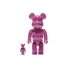 a pink teddy bear and its toy are on the white background, it looks like they have sprinkles all over them