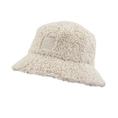 Stay warm and protected from the elements in the CC Sherpa Adjustable Bucket Hat. Its adjustable inner band ensures the perfect fit, while its stylish sherpa material and UVA/UVB sun protection keep you stylish and safe. Enjoy your outdoor activities in comfort and confidence with its lightweight, durable material and easy foldability for travel. Plus, it's distributed by a family-owned USA business and offers truly contagious support and customer service. CC authenticity and quality guaranteed! Usa Business, Holiday Graphic Tees, Holiday Leggings, Patriotic Tees, Scarf Poncho, Essential Bag, Outfits With Hats, Clothing Essentials, Colorful Boho