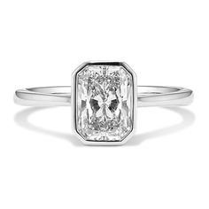 a cushion cut diamond ring in white gold