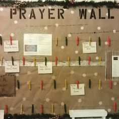 a bulletin board with notes and magnets attached to it's sides that read prayer wall