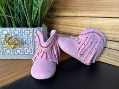 Let's Go Girls! Super cute baby girls cowgirl boots every little cowgirl needs!  Every pair comes packaged it's own keepsake gift box ready to give as a gift or keep for yourself!  ** please note: each pair of shoes is custom made and the rhinestone placement will vary slightly Cute Pink Booties For First Birthday, Cute Pink First Birthday Booties, Pink Booties With Soft Sole For Gift, Cute Soft Sole Booties As Gift, Pink Round Toe Booties For First Birthday, Pink Booties With Soft Sole As Gift, Cute Pink Booties For Gift, Cute Pink Booties As Gift, Cute Handmade Pink Booties