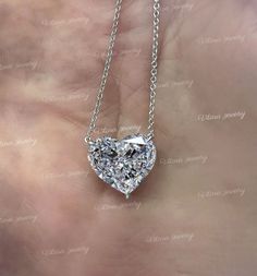 14k solid gold chain Solitaire Moissanite pendant necklace,3.5 CT heart pendant moissanite necklace,Dainty rose gold necklace,layering necklace DESCRIPTION  -------------------- *Moissanite Details  →Stone                            :Heart →Size (mm)                      :10*10 →Stone Total CTW          :3.5 →Color                              :Colorless →Clarity                            :VVS →Gold Purity                    :10k/14k/18k solid gold →chain length                :16 Inch * Metal Dainty Rose Gold Necklace, Dainty Rose, Plus Size Rings, Moissanite Pendant, Minimal Earrings, Moissanite Necklace, Solitaire Pendant Necklace, Necklace Layering, Solid Gold Chains