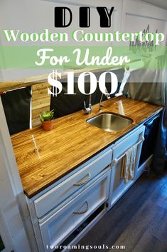 a kitchen counter with the words diy wooden counter top for under $ 100