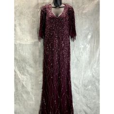 Jkara Women's Wine Beaded Embellished V-Neck Mesh Flutter-Sleeve Gown Sz 12 **** Missing Beads By Zipper; Refer To Image 8 **** Vneck Mesh Flutter Sleeves Floral Beaded Embroidered V-Back Hidden Zipper Floor Length Polyester Dry Clean Imported This Is A Preowned Item In Good Condition. There Are Signs Of Wear. Please Refer To Images. Approx. Measurements: * Waist: " * Length: 52" * Chest: 20" * Sleeves: " * Hip: " Retail Price: $369.00 Sleeve Gown, Woman Wine, Gowns With Sleeves, Waist Length, Flutter Sleeves, Flutter Sleeve, Hidden Zipper, Color Purple, Floor Length