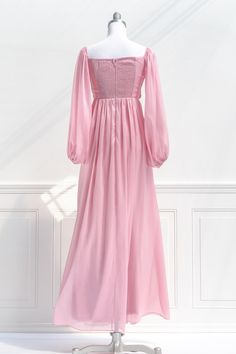 A fairytale-pink gown, the Persephone maxi dress in sparkling blush pink chiffon features a pleated bodice, long sleeves, smocked elastic back with zipper, a sweetheart neckline, and a full, sweeping skirt. Please Note- This item is final sale only. . Details: S: Bust 32"-36", Waist 26"-28", Length 58" M: Bust 34"-38", Waist 28"-30", Length 59" L: Bust 36"-40", Waist 30"-32", Length 60" Skirt Length Waist to Hem: 47" Center Back Zipper 100% Polyester Lined Dry Clean Only Imported Pink Aesthetic Retro, Pink Cottagecore Dress, Funeral Dress, Pink Long Dress, Simple Prom Dress, Light Pink Dress, Cottagecore Dress, Pink Chiffon, Pink Gowns