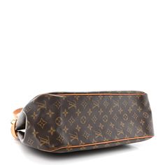 This is an authentic LOUIS VUITTON Monogram Batignolles Horizontal. This shoulder bag is crafted of classic Louis Vuitton monogram-coated canvas. The bag features brass hardware and vachetta leather trim, including side belts and shoulder straps. The top is open to a cocoa brown fabric interior with zipper and patch pockets. Cocoa Brown, Brown Fabric, Brass Hardware, Authentic Louis Vuitton, Leather Trim, Leather Trims, Louis Vuitton Monogram, Patch Pocket, Shoulder Straps