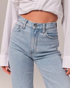 Evoke the nostalgia of the 90s with these Abercrombie & Fitch High Rise Relaxed Jeans, designed to flatter and comfort. These jeans are a modern twist on a classic style, perfect for today's fashion-forward woman.

- Size: 35L
- Color: Light Indigo
- Material: Cotton, Elastane
- Gender: Female
- Style: High rise, relaxed fit with a slim top and wider leg
- Features: Full-length leg, frayed hem

Ideal for casual outings or stylish lounging, these jeans pair effortlessly with your favorite tees or High Rise 90s Relaxed Jean, Relaxed Jeans, 90s Fashion, Abercrombie Fitch, Womens Bottoms, Levi Jeans, Mom Jeans, Full Length, Women Jeans