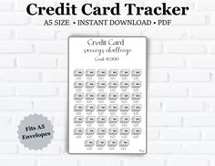 the credit card tracker is displayed on a white brick wall with black and white lettering