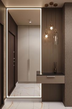 a modern bathroom with marble counter tops and lights on the wall, along with an illuminated mirror