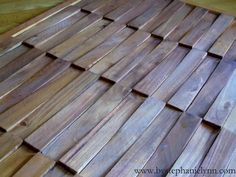 a wooden floor that has been made out of wood planks