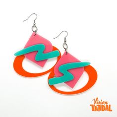 Acrylic statement earrings. Pink, orange and teal  colored. Surgical steel hypoallergenic hooks and hoops. Retro Handmade Orange Earrings, Handmade Retro Orange Earrings, Fun Orange Drop Earrings, Trendy Handmade Orange Hoop Earrings, Earrings Pink, Geometric Earrings, Teal Colors, Pink Orange, Clay Earrings