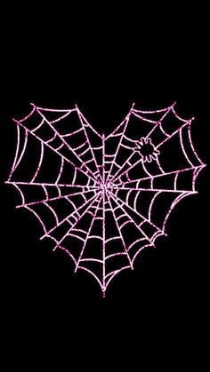 a pink spider web on a black background