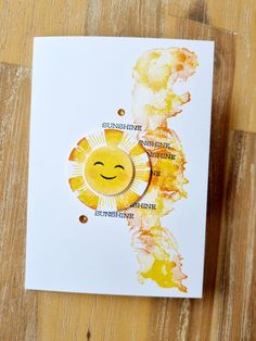 a greeting card with the words sunshine, sunshine and sunshine inside it on a wooden surface