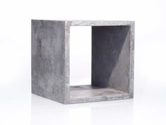 a concrete cube is shown on a white surface