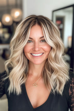 Woman with blonde hair, featuring a trendy blonde shade perfect for 2024. Cooler Blonde Balayage, Hairstyle Ideas For Blonde Hair, Fall Hair 2024 Blonde, Blonde Lived In Highlights, Vanilla Blonde Hair Color Ideas, Cool Lowlights For Blondes, Blonde Hair Color Ideas Winter, Hair Dark Blonde Highlights, Deminsional Blonde