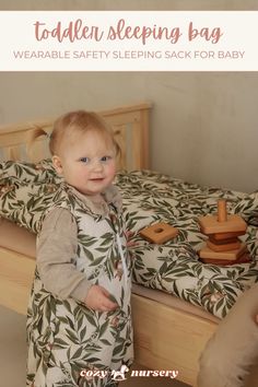 a toddler standing in front of a bed with the words toddler sleeping bag wearable safety sleeping sack for baby