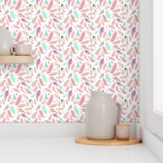 the wallpaper is very colorful and has birds on it, as well as two vases