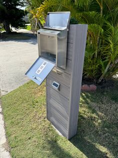 a mailbox with an electronic device attached to it