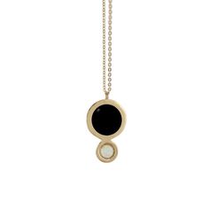 "This unique necklace was handmade using traditional metalsmithing techniques and the lost wax casting process. Handmade in Chicago by Therese Kuempel. Brass, Black Onyx, and Opal. Black Onyx measures 12mm, Opal measures 6mm. Hangs from a 28\" Gold-Plated chain. Chain length also available in 18\", 24\", and 32\" upon request. All of our brass is nickel free." Crystal Ball Necklace, Jewelry Safe, Wax Casting, Ball Necklace, Lost Wax Casting, Unique Necklace, Lost Wax, Brass Jewelry, Brass Chain