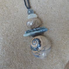 Chunky Moon Shell, BeachPebble, Kyanite, Petrified Wood, Labradorite necklace all-natural ocean jewelry & handmade Australia, layering Fibonacci Sequence In Nature, Fibonacci Sequence, Three Necklaces, Ocean Jewelry, Shell Beach, Labradorite Necklace, Labradorite Necklaces, Blue Kyanite, Petrified Wood