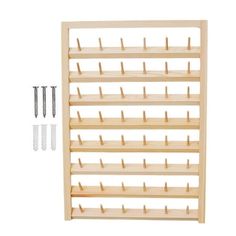 a wooden rack with several pegs and screws