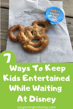 some pretzels are sitting on paper with the words 7 ways to keep kids entertained while waiting at disney