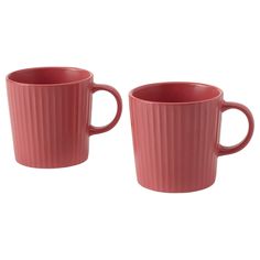 two red mugs sitting next to each other