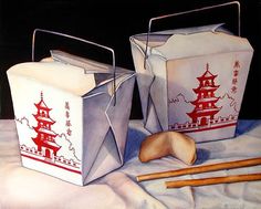 two chinese takeout boxes with chopsticks on a table