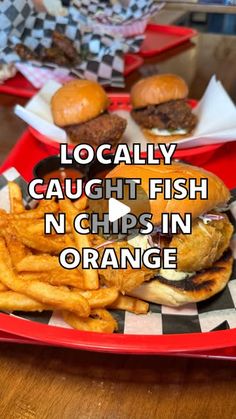 an image of a plate with food on it that says locally caught fish n chips in orange