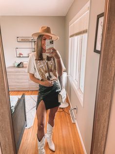 The Dixie Chicks Concert Outfit, Country Concert Tee Outfit, Shiana Twain Concert Outfit, Country Concert Leather Skirt, Shaina Twain Concert Outfit Ideas, Graphic Tee Country Concert Outfit, Leather Skirt Country Outfit, Causal Concert Outfit, Shania Twain Outfits Concert