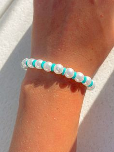 Almosat out now! Teal Bracelet Ideas, Round Beads Bracelet, Teal Clay Bead Bracelet, Pearl And Clay Bead Bracelet, Braslite Ideas, Cute Pearl Bracelet Ideas, Preppy Clay Bead Bracelets Ideas Aesthetic, Pearl Bead Bracelet Ideas, Clay Bead Bracelet Ideas With Pearls